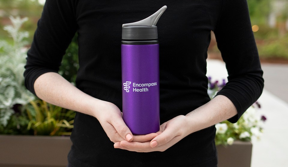Purple Encompass Health refillable water bottle