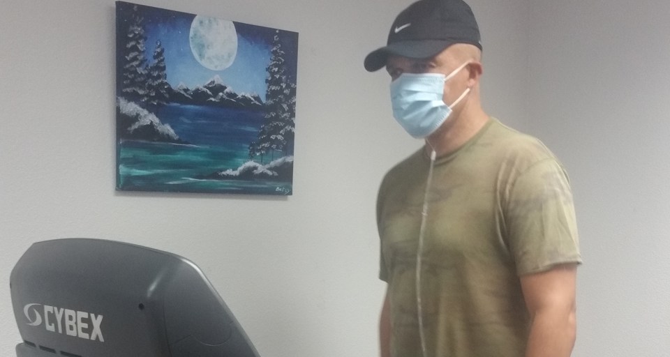 Renaldo Wall on treadmill on oxygen with mask