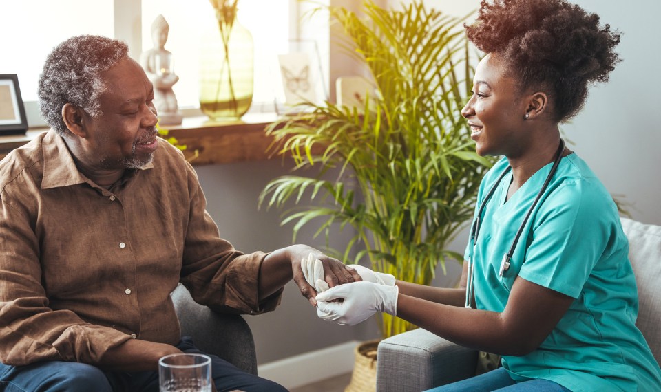 nurse talking to patient with dementia