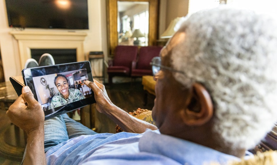 son long-distance caregiving with dad on video call