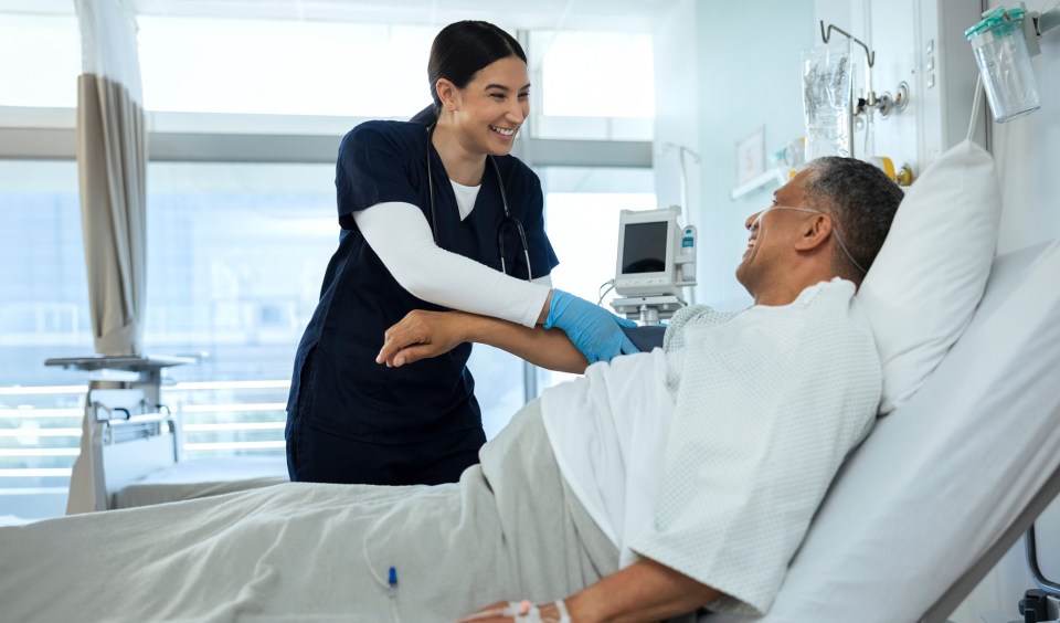 Nurse providing customer services to patient